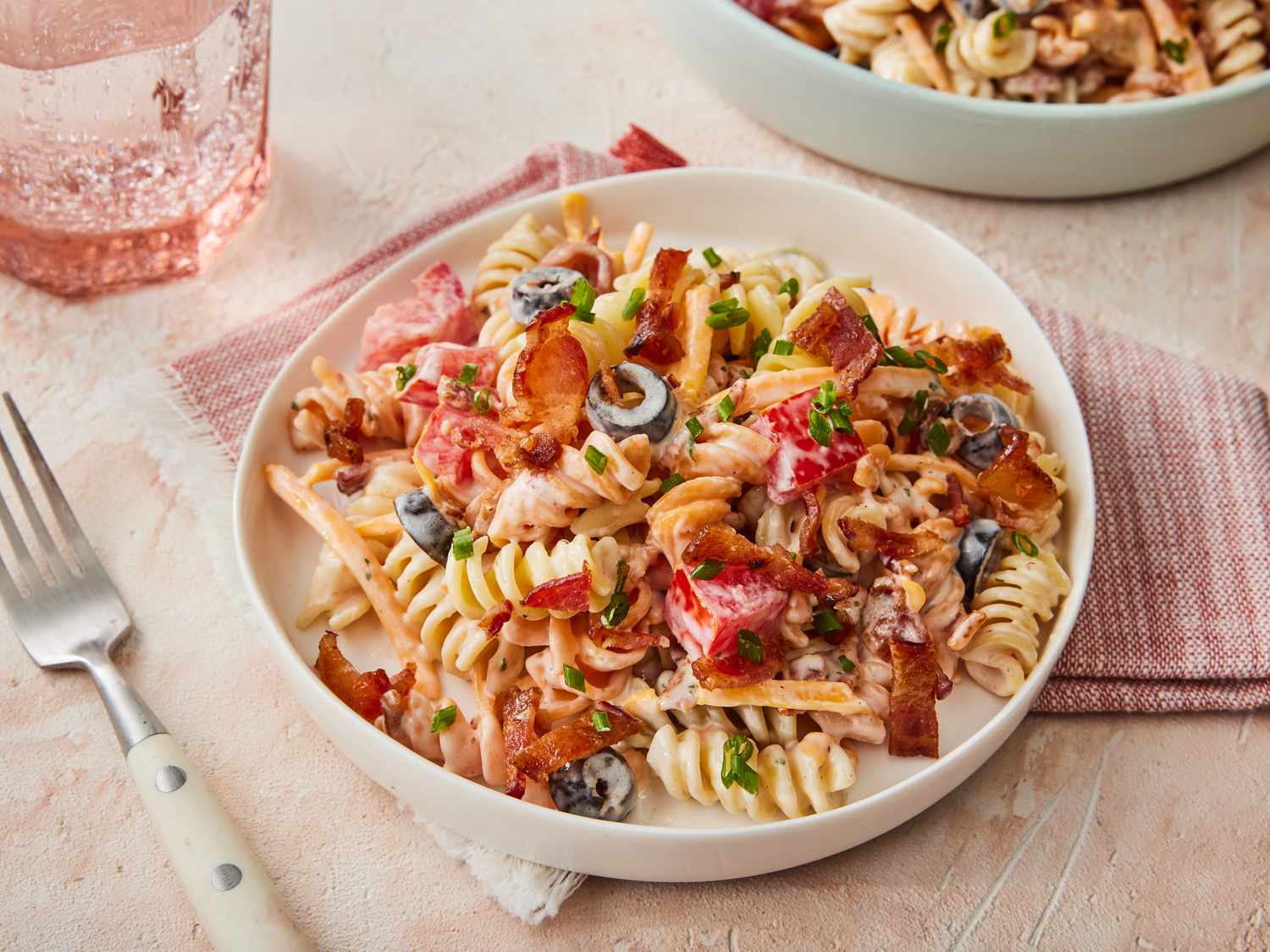 Bacon ranch pasta salad with cheddar peas and green onions