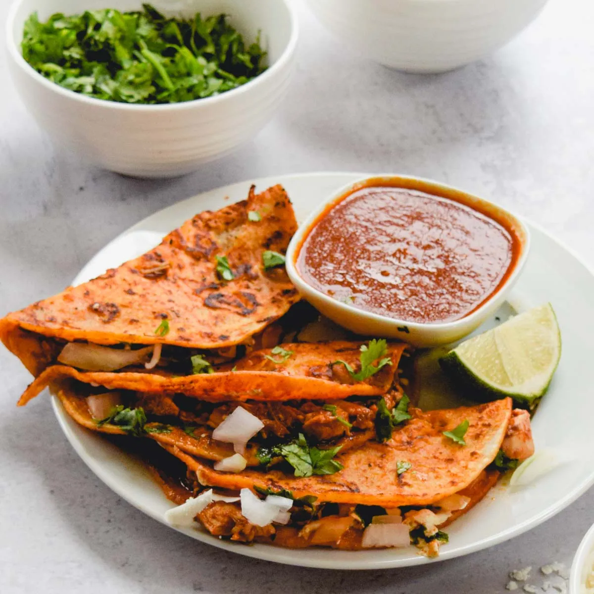 Chicken birria tacos crispy dipped tortillas with consomme