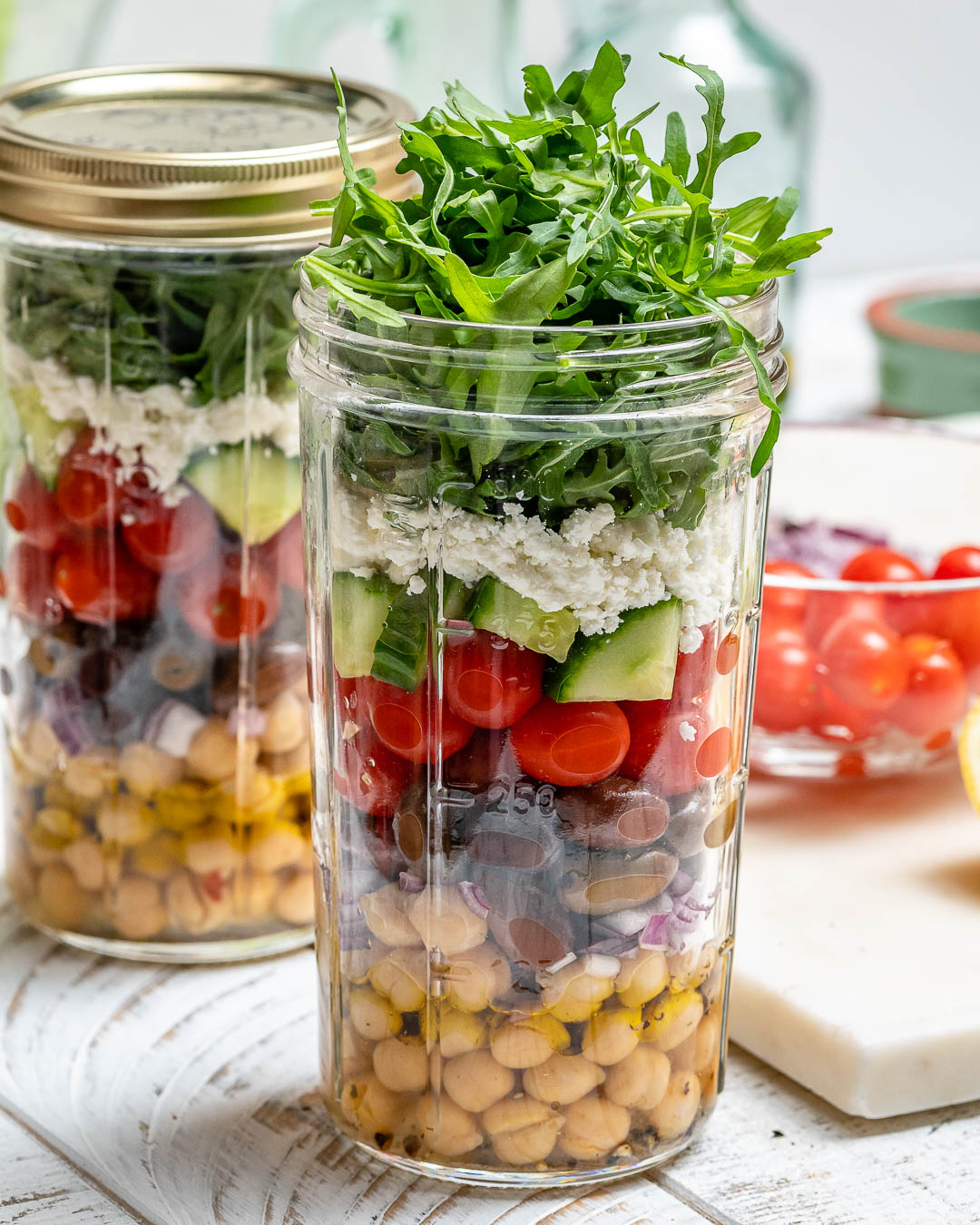Greek chickpea jar salad with cucumber tomatoes olives and feta