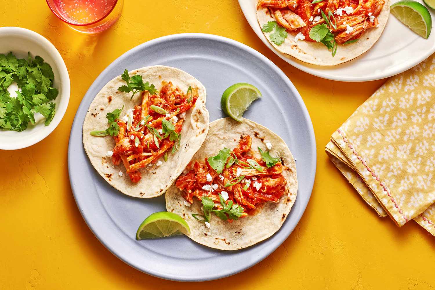 Chicken tinga tacos with smoky chipotle sauce and avocado