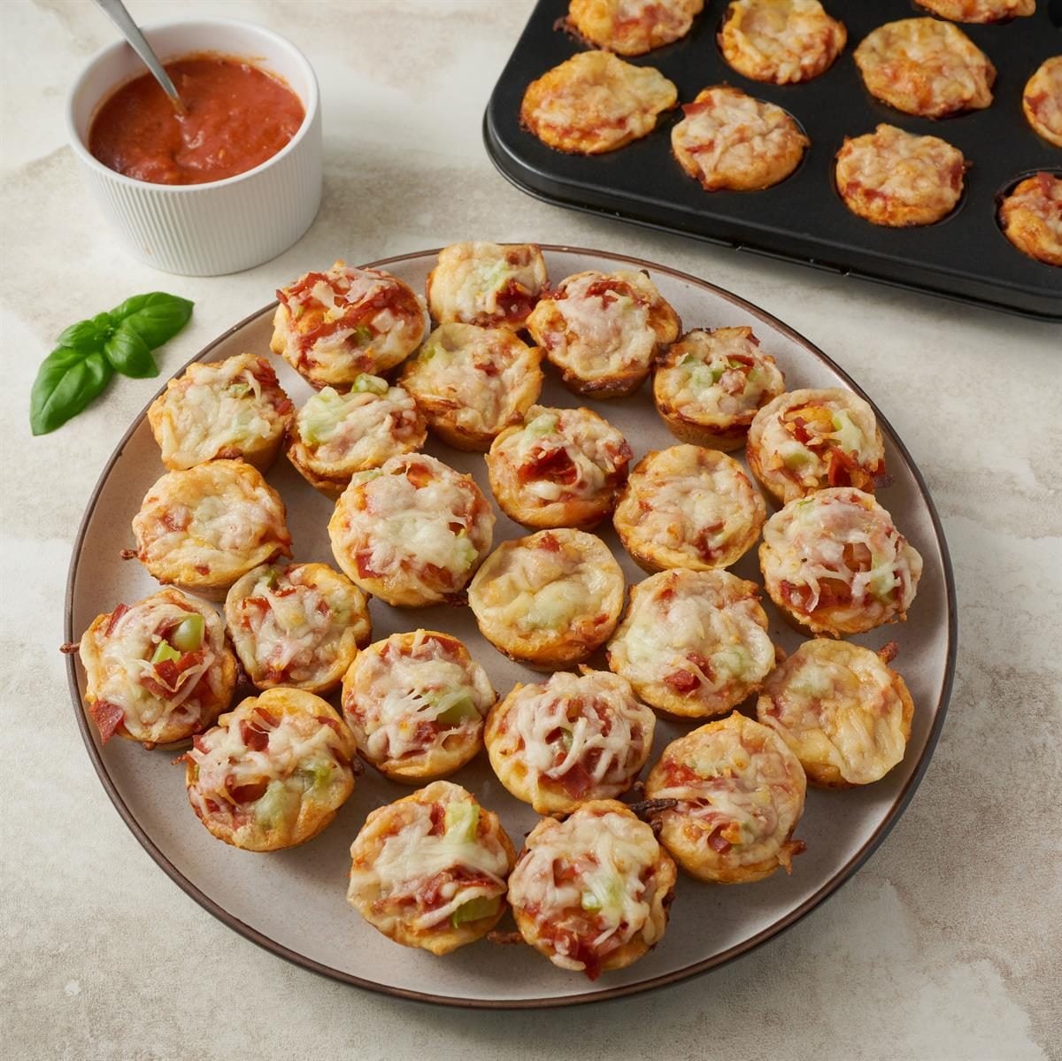 Mini pizza bites baked golden for picnic snacks