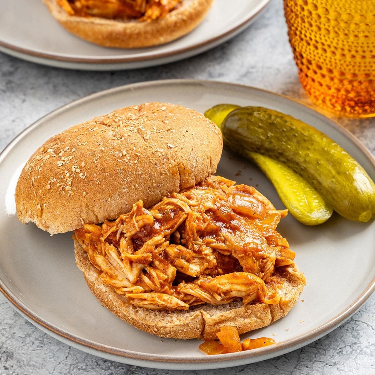 pulled chicken sandwiches with BBQ sauce and coleslaw