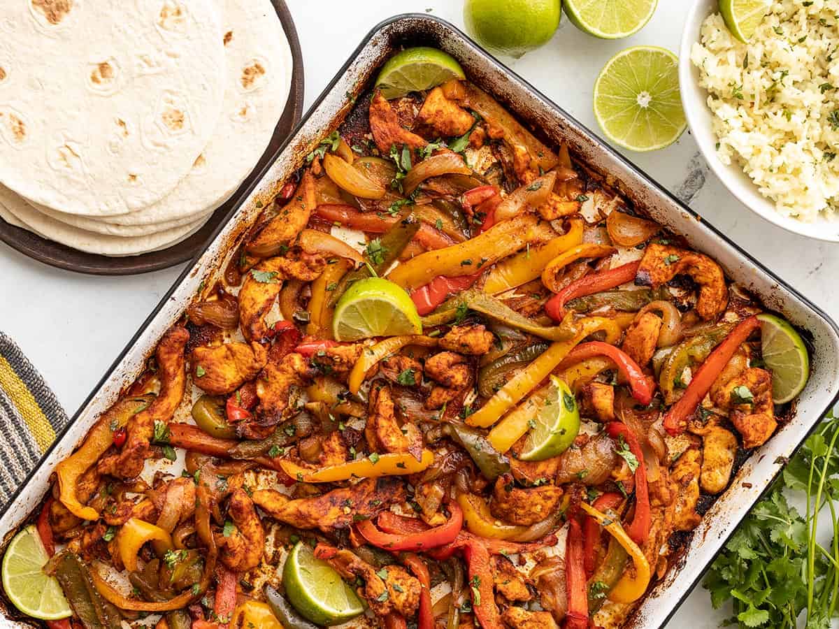 Sheet pan chicken fajitas with peppers and onions