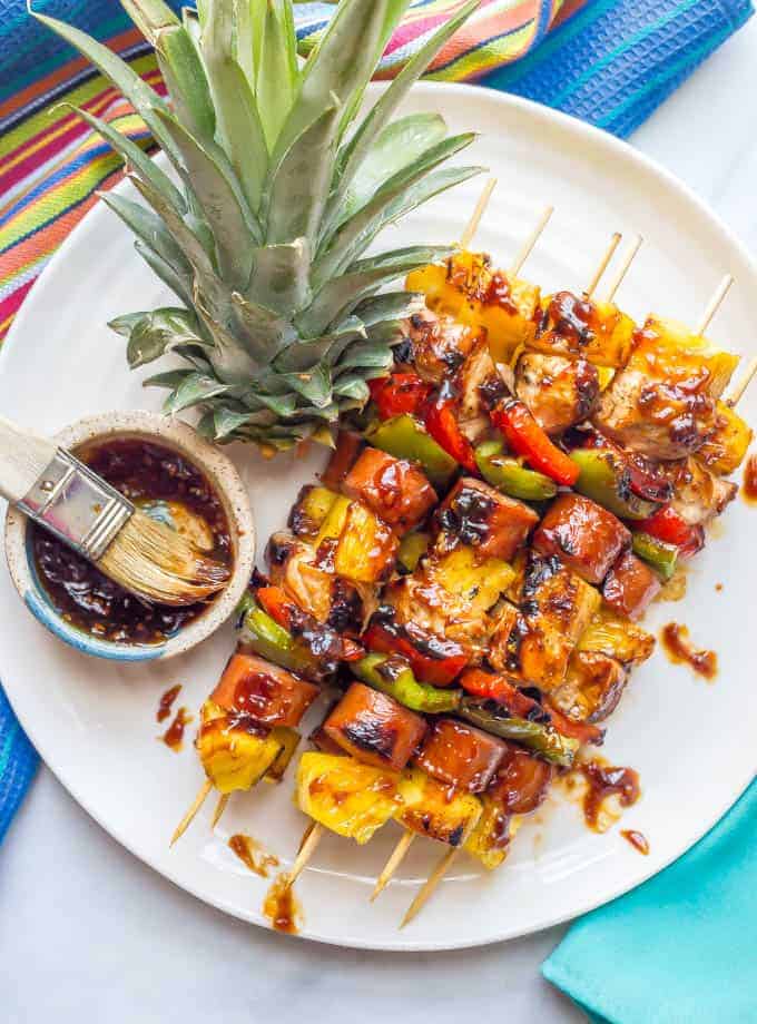 Teriyaki chicken pineapple skewers on a grill