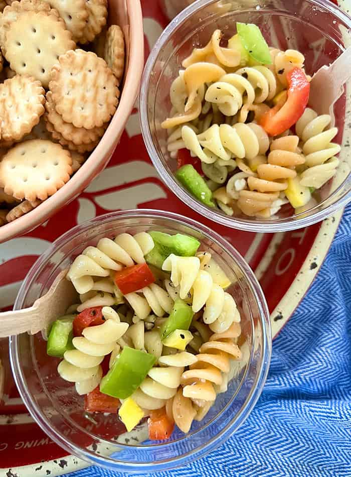 Italian pasta salad cups with mozzarella tomatoes cucumber and pepperoni
