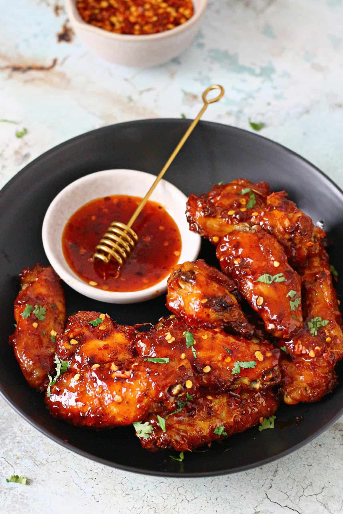Hot honey chicken wings cooked on the grill