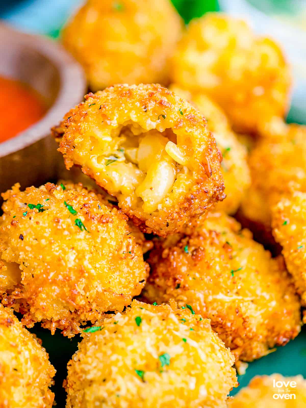 mac and cheese bites baked in a muffin tin for party food