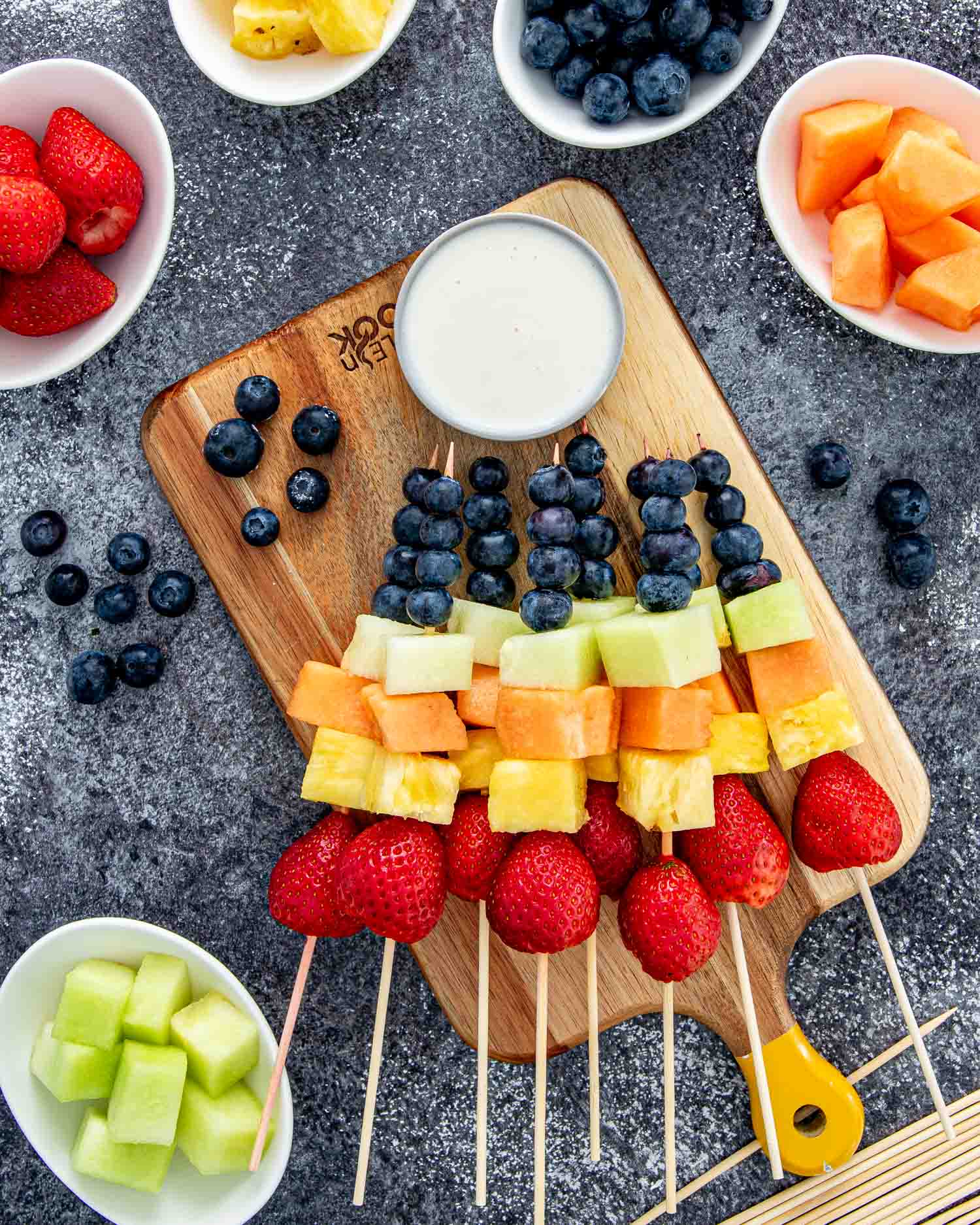 fresh fruit skewers with honey yogurt dip for a backyard party