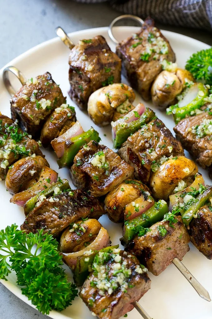 Garlic butter steak kabobs with peppers and onions