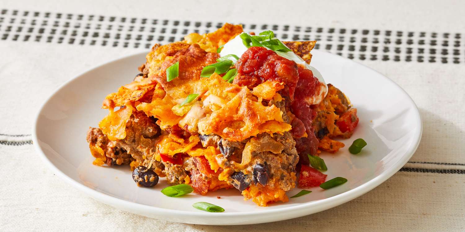 Dorito Mexican casserole with crunchy chip topping and melted cheese