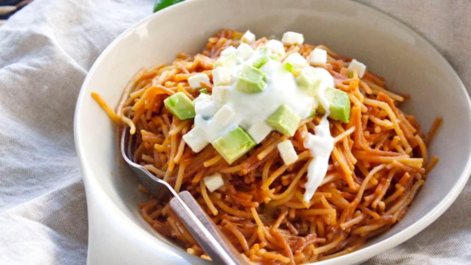 Mexican noodle casserole with pasta beef and melted cheese