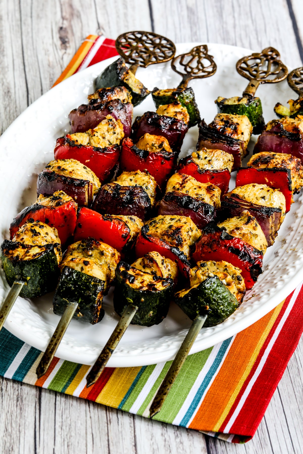 Grilled chicken and vegetable skewers with peppers zucchini and lemon