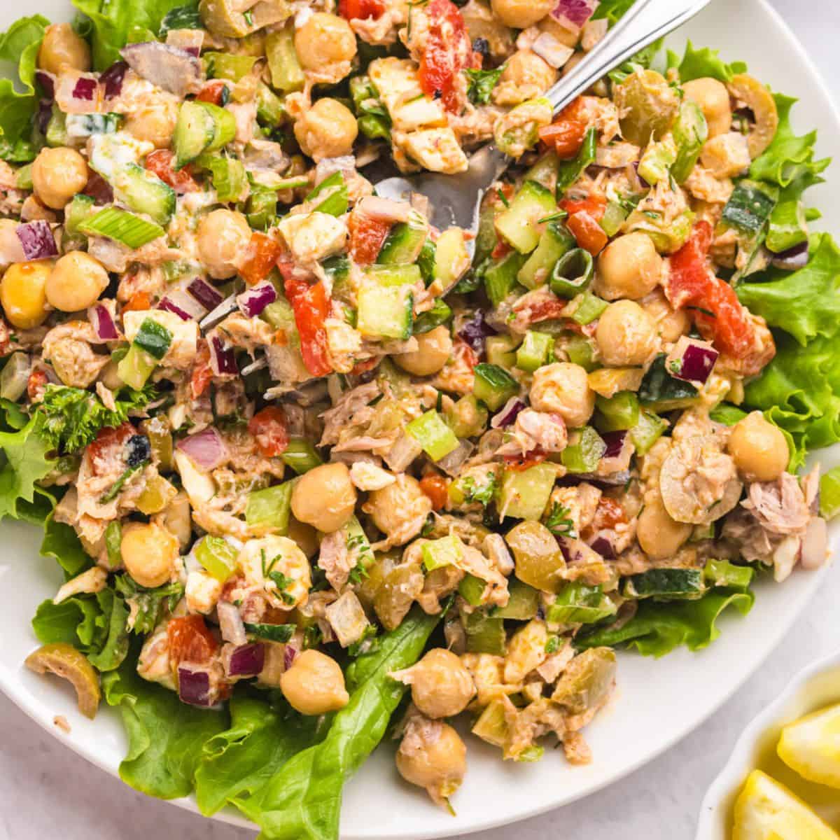 Mediterranean tuna chickpea salad with cucumber tomato olives and feta