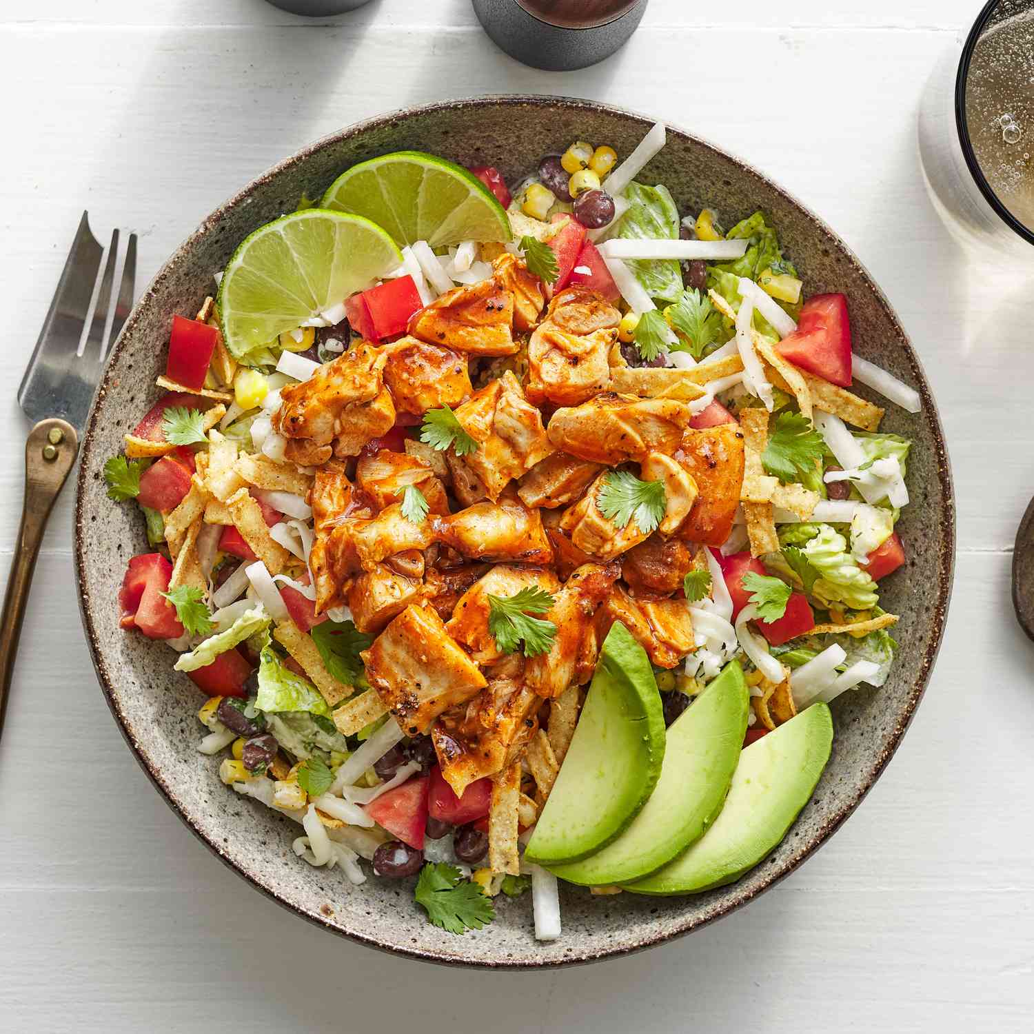 BBQ chicken chopped salad with corn black beans avocado and tomatoes