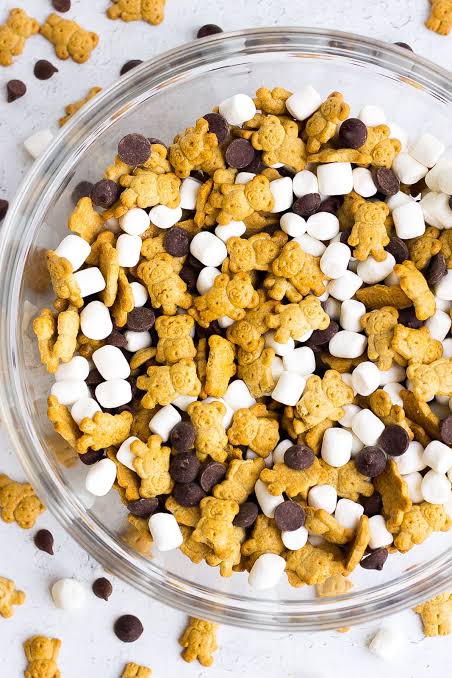 Smores trail mix with graham cereal marshmallows chocolate pretzels and peanuts