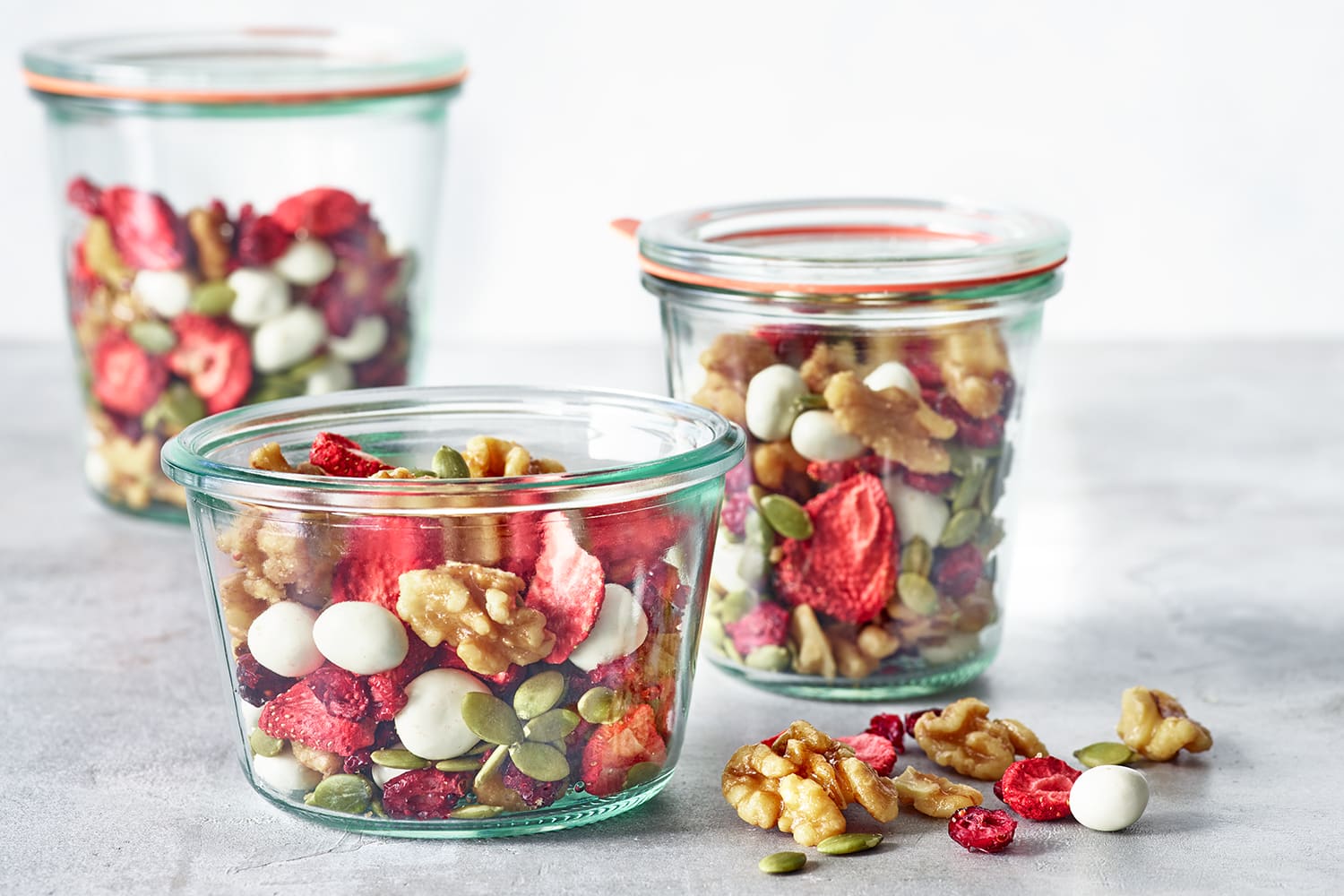 Berry yogurt trail mix with dried strawberries blueberries almonds cashews cereal coconut and yogurt chips